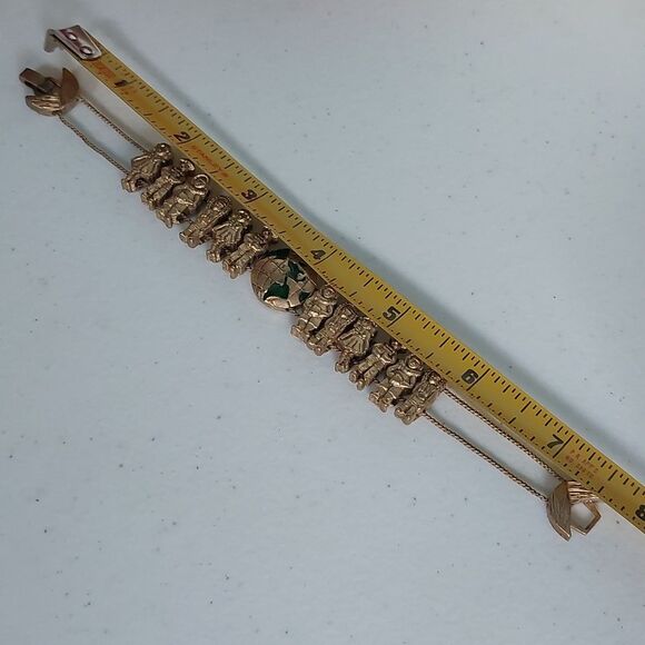 Vintage Unsigned Children of The World Gold Tone Tofa Style Slider Bracelet - Picture 6 of 6